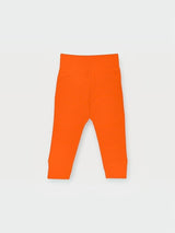 Iksplor baby merino wool leggings in orange with a comfortable wide waistband for a secure fit. #color_poppy
