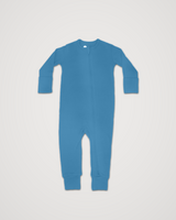Merino Wool Adventure Zippy baby romper in medium blue, laid flat with front zipper #color_blue sky