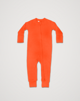 Merino Wool Adventure Zippy baby romper in orange-red, laid flat with front zipper #color_poppy