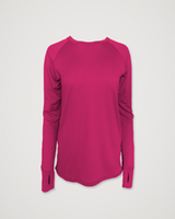 Iksplor magenta pink merino wool long sleeve top with raglan sleeves and thumbhole cuffs, laid flat against a light background. #color_peak pink