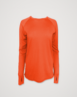 Iksplor bright orange merino wool long sleeve top with raglan sleeves and thumbhole cuffs, laid flat against a light background. #color_poppy