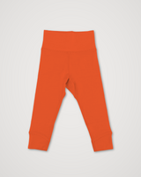 Iksplor baby merino wool leggings in vibrant orange with a comfortable wide waistband for a secure fit. #color_poppy