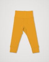 Iksplor baby merino wool leggings in vibrant yellow with a comfortable wide waistband for a secure fit. #color_yellowstone