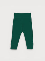 Iksplor baby leggings in forest green merino wool with a comfortable wide waistband for a secure fit. #color_juniper