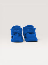 Iksplor baby merino wool booties in bright blue with a secure snap closure for a comfortable fit. #color_ocean