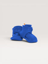 Iksplor baby merino wool booties in bright blue with secure snap closures for a comfortable fit. #color_ocean