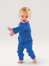 Iksplor baby wearing a vibrant blue merino wool zip romper with long sleeves and snug cuffs for all-season comfort. #color_ocean