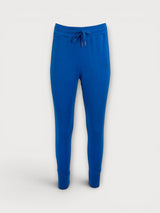 Iksplor blue merino wool adventure joggers with a high-rise drawstring waist and slim-fit tapered legs. #color_ocean