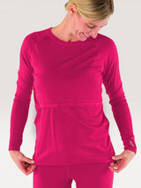 Iksplor fuchsia merino wool long sleeve nursing top with thumb holes on a smiling woman #color_peak pink