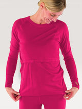 Iksplor fuchsia merino wool long sleeve nursing top with thumb holes on a smiling woman #color_peak pink
