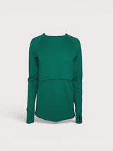 Iksplor green merino wool long sleeve nursing top with thumb holes and discreet breastfeeding access. #color_evergreen