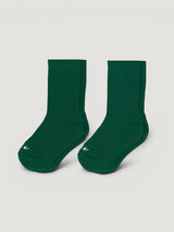 Iksplor dark green merino and tencel blend trail socks for kids and adults with a minimalist knit design. #color_jungle trek