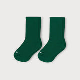Iksplor dark green merino and tencel blend trail socks for kids and adults with a minimalist knit design. #color_jungle trek
