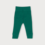 Iksplor baby merino wool leggings in forest green with a comfortable wide waistband for a secure fit. #color_evergreen