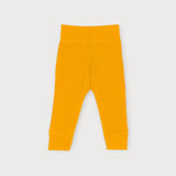 Iksplor baby leggings in mustard yellow merino wool with a comfortable wide waistband for a secure fit. #color_yellowstone