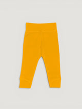 Iksplor baby leggings in mustard yellow merino wool with a comfortable wide waistband for a secure fit. #color_yellowstone