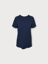 Iksplor navy blue merino wool t-shirt with short raglan sleeves and a curved hem for breathable outdoor comfort. #color_starry night