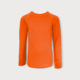 Iksplor kids long sleeve merino wool top in bright orange with thumbhole cuffs for warmth and comfort.  #color_poppy