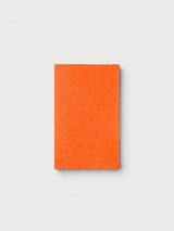 Iksplor bright orange merino wool iron-on patch for repairing sweaters and knitwear garments. #color_poppy