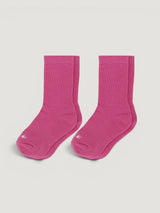 Iksplor pink merino wool and tencel blend trail socks for kids, featuring a comfortable stay-put design. #color_desert rose