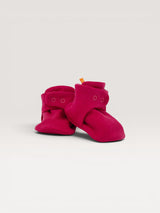Iksplor baby merino wool booties in bright pink with secure snap closures for a comfortable, stay-on fit. #color_peak pink