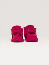 Iksplor baby merino wool booties in bright pink with a secure snap closure for a comfortable fit. #color_peak pink