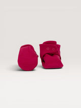 Iksplor baby merino wool booties in deep pink with a secure snap closure for a comfortable fit. #color_peak pink