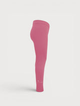 Iksplor kids pink merino wool base layer leggings with a side view showing a comfortable, breathable fit. #color_alpenglow