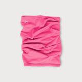 Iksplor bright pink merino wool neck gaiter with a small white mountain logo on a light grey background. #color_alpenglow