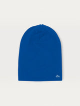Iksplor royal blue merino wool beanie for kids with a small white mountain logo on a light background. #color_ocean