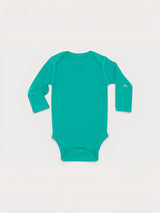 Iksplor baby long-sleeve bodysuit in vibrant teal merino wool with a small mountain logo on the left sleeve. #color_tidepool