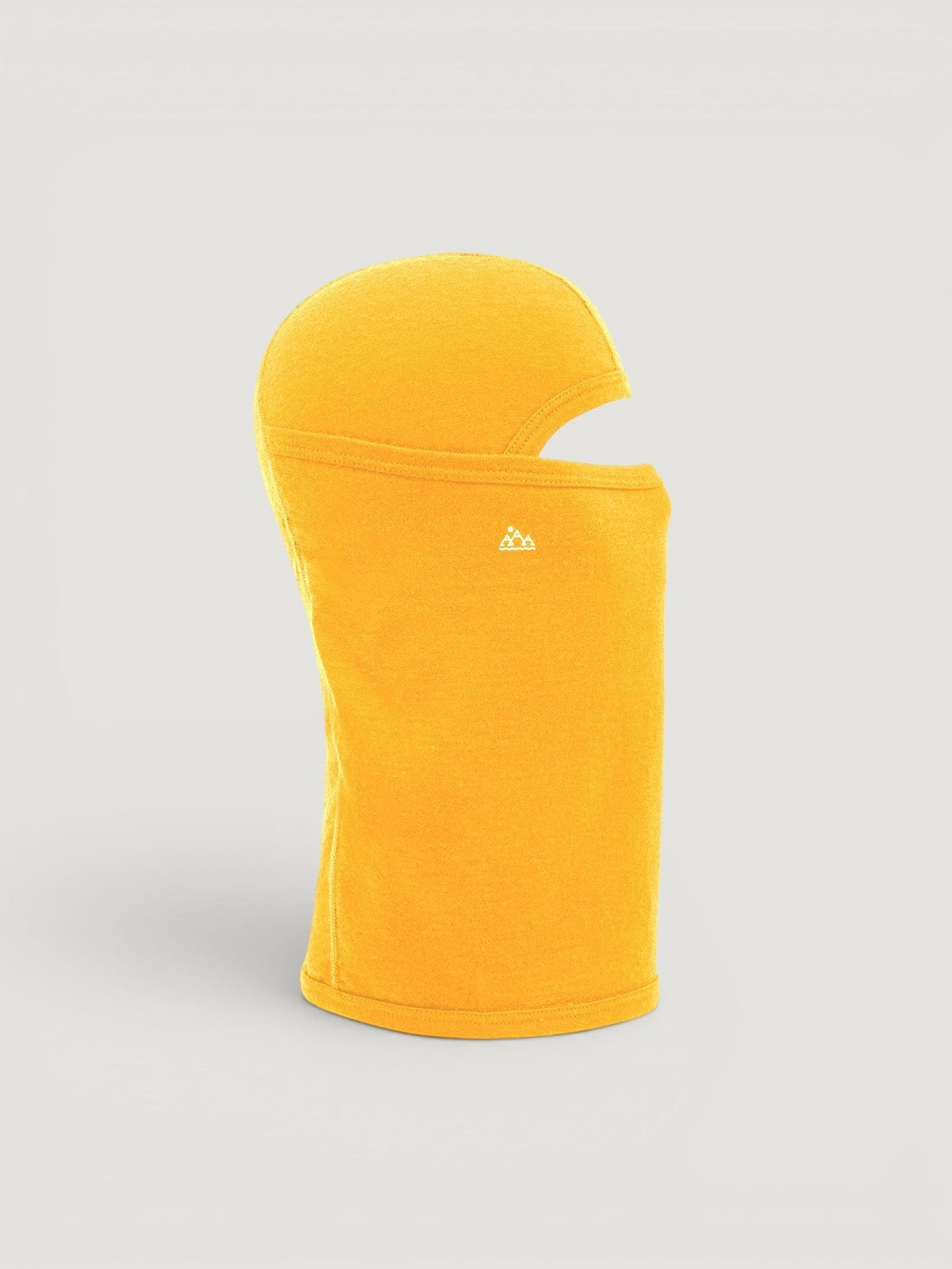 Iksplor yellow merino wool balaclava with a ponytail hole for winter outdoor activities. #color_yellowstone