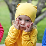 Iksplor child wearing a soft yellow merino wool beanie outdoors  #color_yellowstone